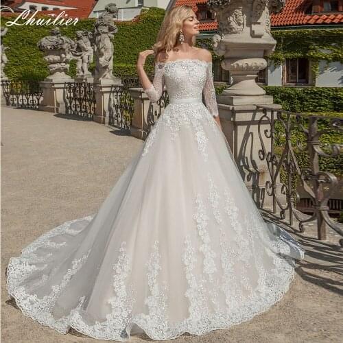 Lhuilier Elegant A-line Boat Neck Lace Wedding Dresses 2021 Floor Length Full Sleeves Court Train Bridal Dress with Belt