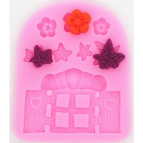 The window and flowers are turned into a sugar - cake silicone mold and a diy chocolate mould