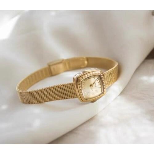 Light luxury small oval dial fine steel golden watch strap retro gold lady watch