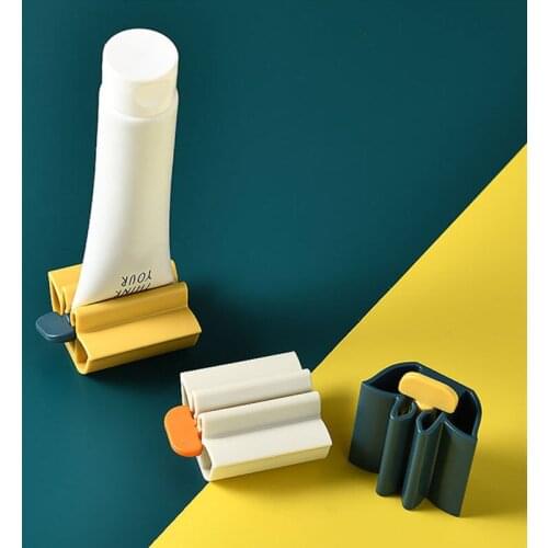 New Toothpaste Squeezer Tooth Paste Dispenser Tube Squeezer Facial Cleanser Press Rolling Holder for Kids Bathroom Accessories