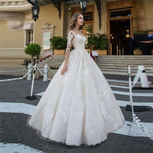 New Arrival Ball Gown Wedding Dresses Long Sleeves Lace Appliques Pleated Custom Buttons Back Bride Gowns Vestidos De Mariee