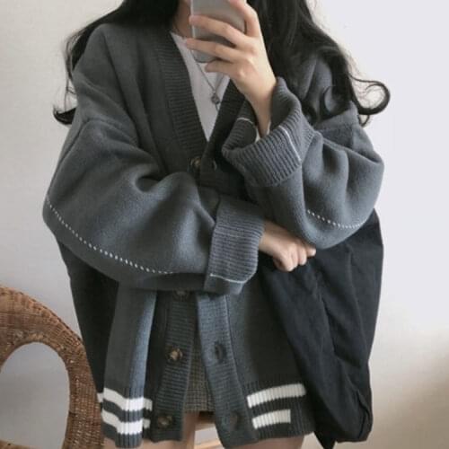 Korean knitted sweater womens lazy college style loose sleeve womens long sleeve V-neck button large jacket autumn and winter