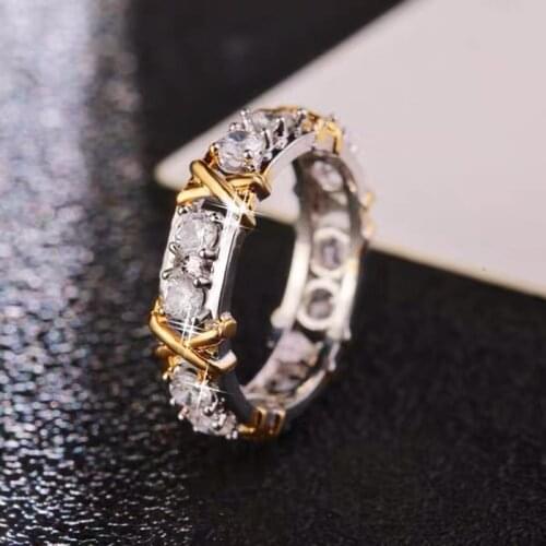 Alloy plated dot drill process ladies cross fashion simple two-color ring