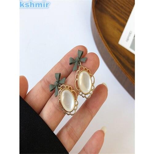 Kshmir 2021 Vintage Bow Earrings Feminine Hollow Opal Earrings Fashion Baroque Earrings Exquisite gift for women