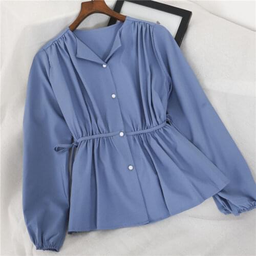 Lantern sleeve V-neck casual shirt women 2021 spring and autumn new Korean fashion design sense retro waist tie loose top