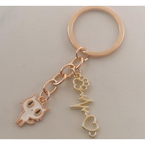 Hot-selling cute couple cat keychain, couple outfit alloy enamel, fashion accessories, car keychain, birthday gift