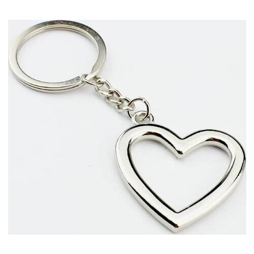 Character hollowed-out peach heart key chain creative metal heart pendant small gift