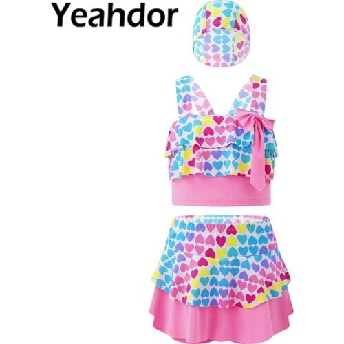 3Pcs Kids Girls Swimwear Straps Bowknot Cartoon Print Crop Tops with Ruffle Hem Skirt and Cap Set for Beach Swimming Bathing