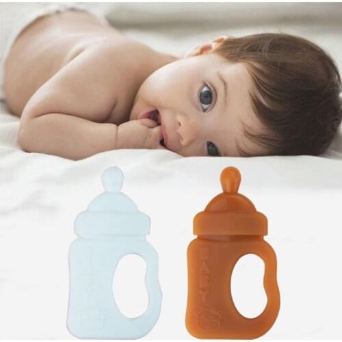 Cartoon Milk Bottle Shape Baby Teether Silicone Chewing Teething Nursing Soother Y4QA