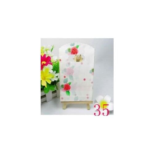2017 New Design Wholesale 50pcs/lot 9*15cm High Quality Small Beige Gift Packaging Bags With Rose Flower Favor Birthday Packing