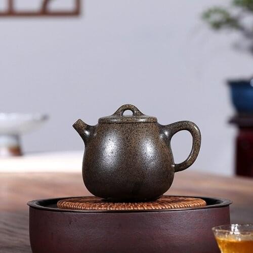 Yixing purple clay teapot is made of pure handmade materials. Its a 210cc pure strength tea pot
