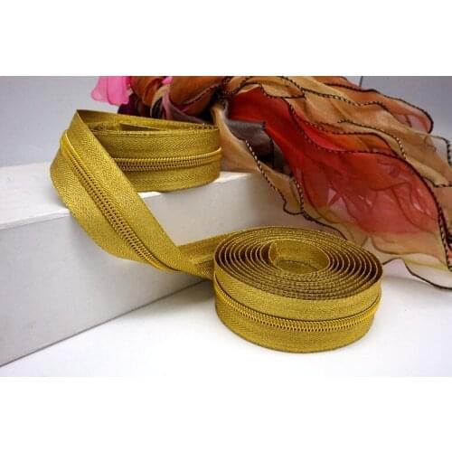 100M zip and 50PCS zip sliders/5#7#nylon zipper/close-end/golden for bags shoes garment Gold zipper head/free shipping
