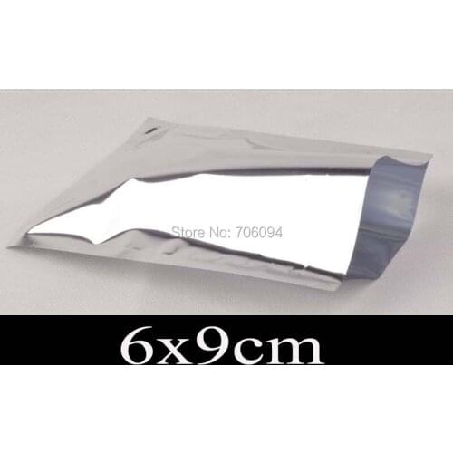300pcs 6*9cm,shiny silver Aluminum Foil Plastic Bag,Heat seal silver Aluminum foil bag,Plain pocket plastic food Bag