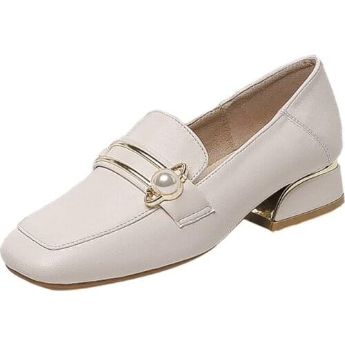 YOMINIE Leather Pumps