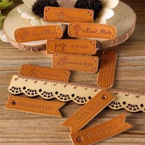 New 10 styles 100 Pcs/Set Handmade Patchwork Labels PU Tags DIY Sewing label cloth Garment Labels For Sewing Accessories