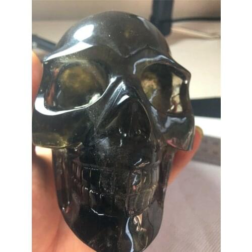 Natural brown crystal skulls about 11 cm in length and about 1.2 kg in weight