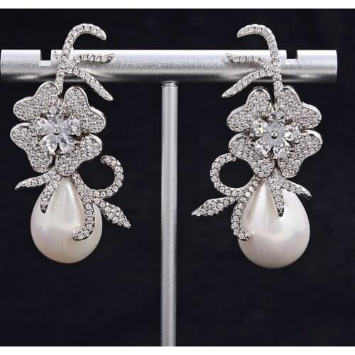 GuaiGuai Jewelry Teardrop White Sea Shell Pearl Clear Cz Pave Flower Stud Earrings