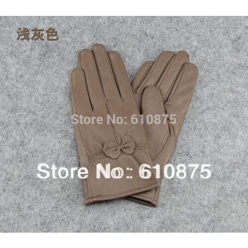Female autumn 100% sheepskin gloves women 100% sheepskin bow warm glove woman plus velvet warm gloves lady winter thick glove