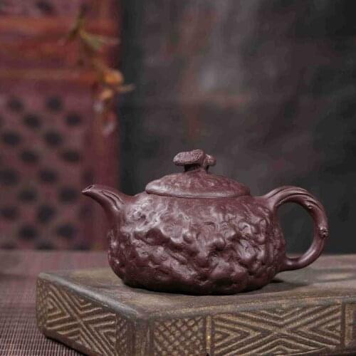 Gong Chun pot of traditional manual undressed ore painted purple mud carved the teapot tea wholesale gift manufacturer