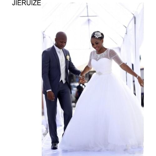 JIERUIZE African Wedding Dresses O Neck Illusion Half Sleeves Lace Up Back Crystal Sash Ball Gown Wedding Gowns Bridal Dresses