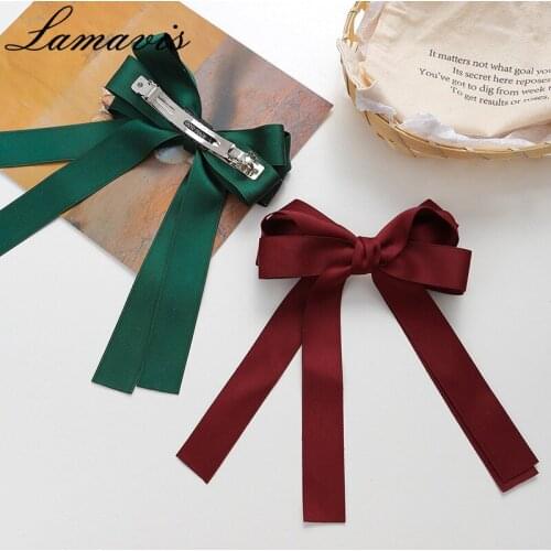Japanese And Korean Ribbon Bow Hairpin Series Female Super Fairy Cloth Spring Clip Temperament Back Head Half Tie Head Clamp