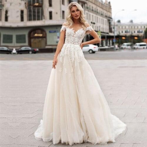 Beach Champagne Tulle Wedding Dresses Boho Lace Appliques Bridal Gown O-neck illusion Cap Sleeves Vintage A-line Wedding Gowns