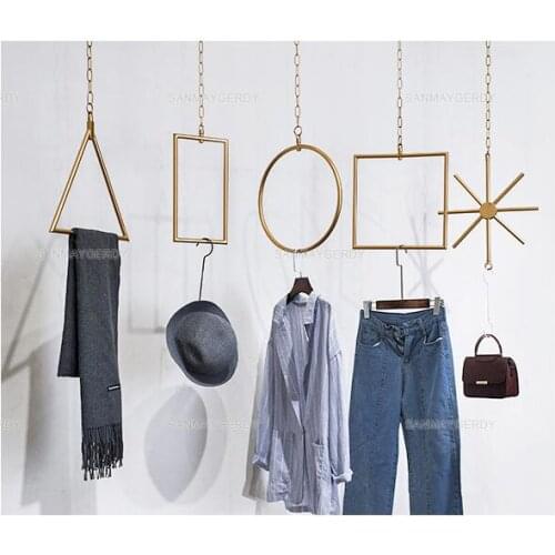 Womens clothing store display rack The Wall rings iron decorative hanging shelves clothing store gold window wall hanging