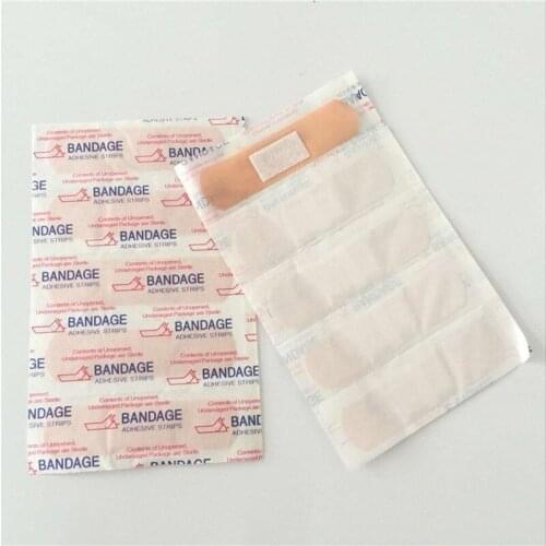 100Pcs/Pack Non-woven Wound Adhesive Plaster Medical Anti-Bacteria Band Aid Bandages Sticker Home Travel First Aid Kit Supplies