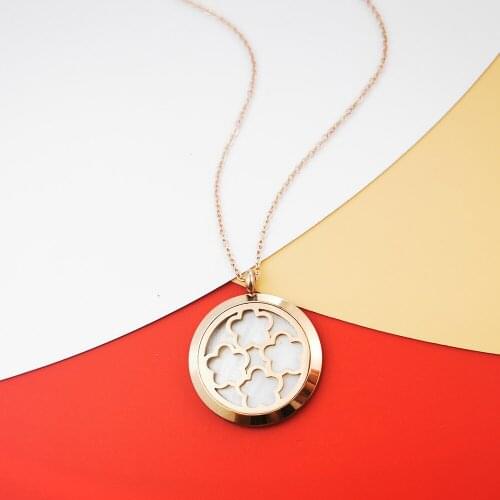 European and American retro fashion trendy men and women hollow plum blossom clavicle chain pendant