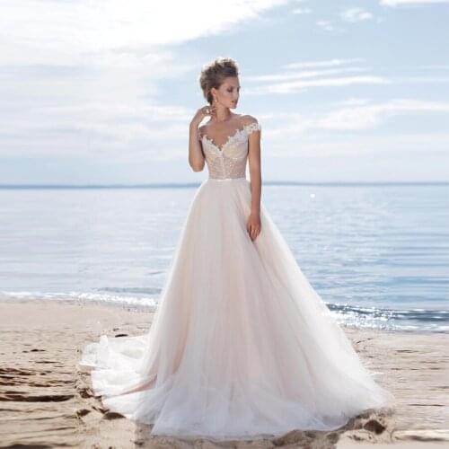 Sexy Off-the-shoulder Tulle Lace Beaded A-line Wedding Dresses 2020 Illusion Back Court Train Bride Wedding Gowns With Bow Belt
