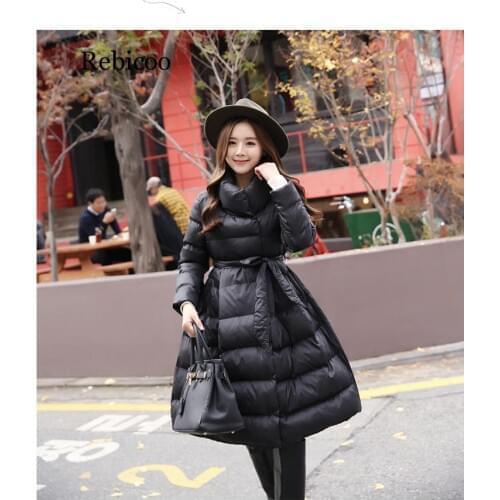 Winter fashion women Coats medium-long cotton-padded jacket Thick lacing waist Large Hem Parka Overcoat
