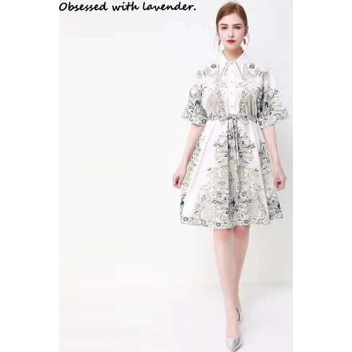 Obsessed with lavender.Summer new womens French retro printed beaded lapel short sleeve loose lace waist dress