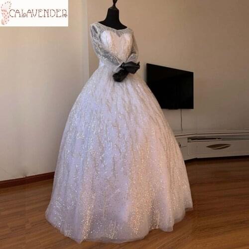 Illusion V-Neck Ball Gown Wedding Dresses Sequined and Major Beaded Luxury Wedding Dress Floor Length Long Sleeve Wedding Dress