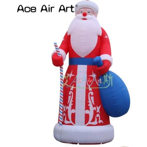 Christmas event decortions with candy sticks and gifts inflatable pope santa claus for sale