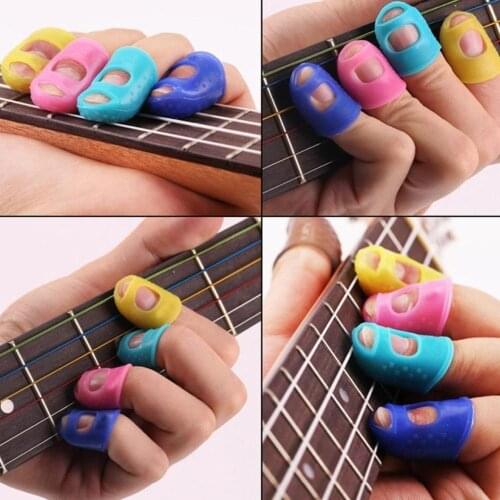 5Pcs Silicone Guitar Thumb Finger Picks Protector Plectrum Fingertip thimble Finger Guard safety protect caps Colors Random