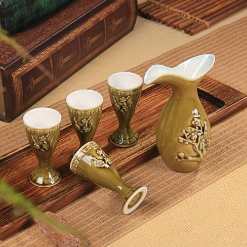 A pot of four antique Chinese ceramic wine set white wine liquor cup goblet small jue-shaped cup gift box wineware