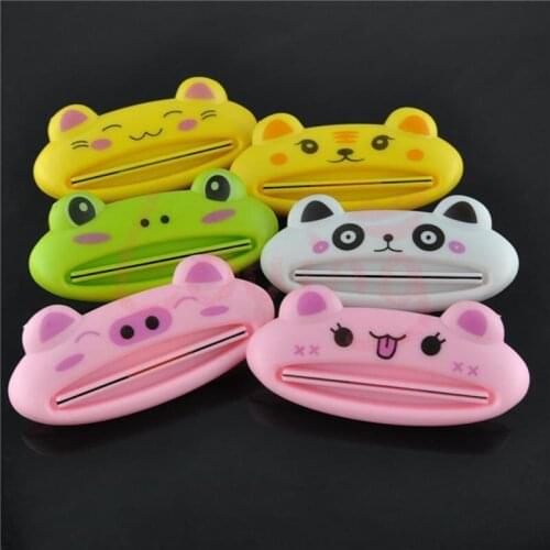 1pcs Cute Plastic Toothpaste Tube Squeezer Bathroom House Tube Roling Holder Easy-using Toothpaste Dispenser Color Random