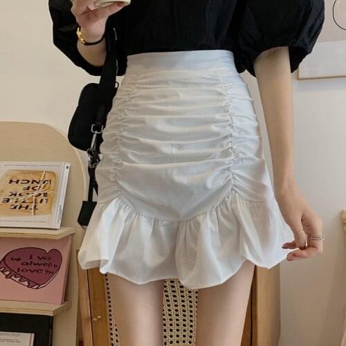 Half-length skirt female early spring 2021 new design sense pleated A-line skirt wild fishtail bag hip skirt