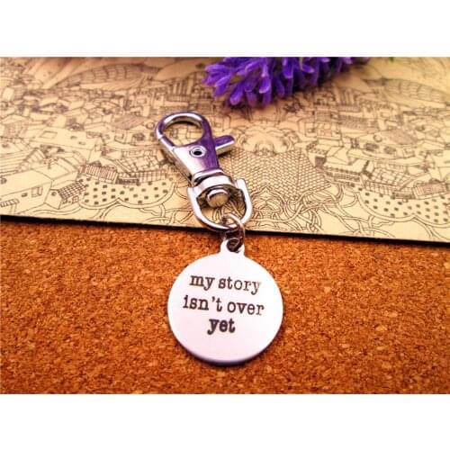 3pcs/lot high quality keychain with 20mm stainless steel circle round " my story isn't over yet " charms keychain