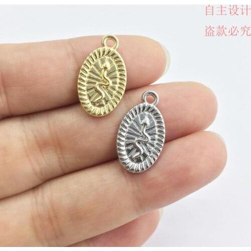 Eruifa 20pcs 11*16mm Oval Snake print gold/Silver plated Zinc alloy Charms Pendant Jewelry DIY Necklace 2 colors