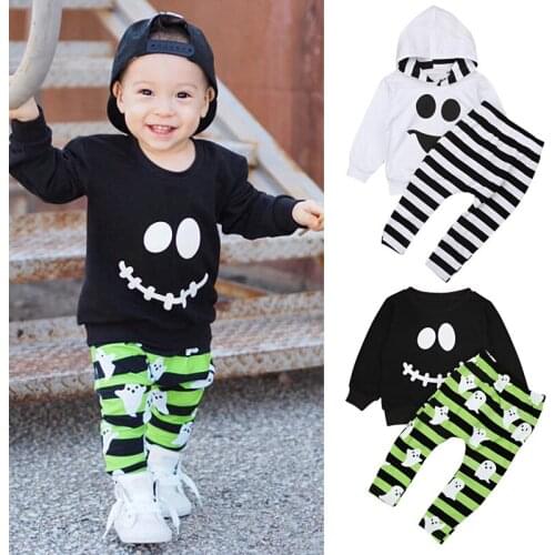 Childrens spring and autumn boys' long-sleeved Halloween smiley expression two-piece striped childrens sweater + trousers