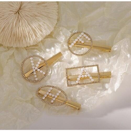 2021 Wholesale South Korea Pearl Hairpin Hairpin One-word Clip Side Bangs Seaside Clip Net Red 2021 Letter Girl Clip Headdress