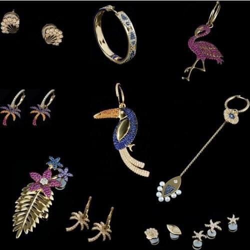 Heavy recommendation A home June new luxury earrings female summer wind vacation marine color golden toucan migratory bird palm