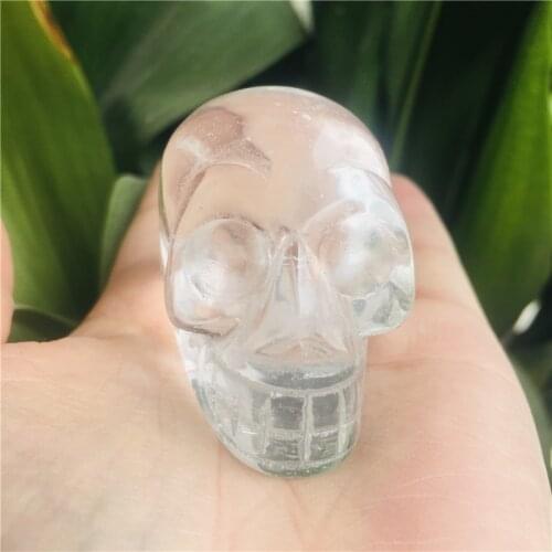 Natural crystal white smelting crystal carving skull healing cluster by hand