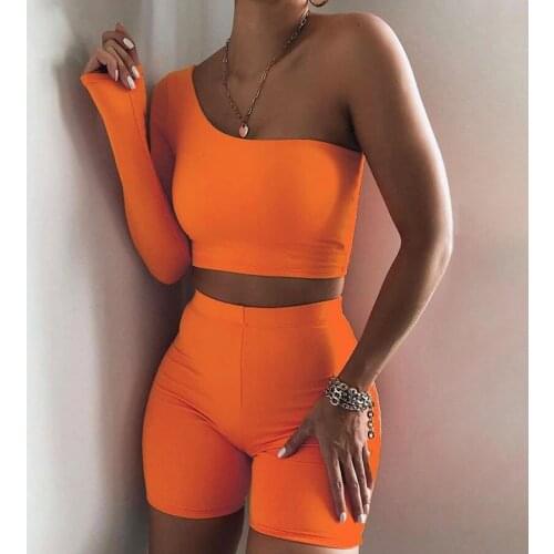 European and American Sexy Womens Orange One-Shouldered Long-Sleeved Jacket Sports Running Tight Shorts Two Suit