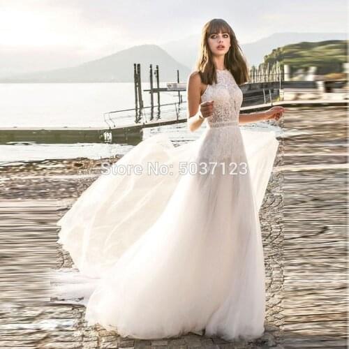 Beach Tulle A Line Wedding Dresses Halter Sleeveless Vestido De Noiva Lace Appliques Open Back Bridal Gown Court Train