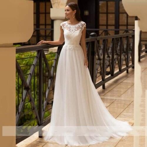 Vintage Bohemian Lace Wedding Dresses O-Neck Cap Sleeves Tulle A Line Bridal Gowns Floor Length Vestido De Noiva 2021 Plus Size