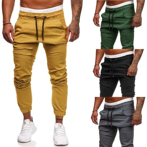 2020 Mens Pants Youth Casual Long Trousers Solid Color Tie Rope Elastic Sports Baggy Pants Overalls Trousers European American
