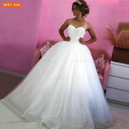 Elegant White Beaded Wedding Gowns 2021 Lace Up Sweetheart Vestidos De Noiva Tulle Ball Gown Bride Dresses Ivory Suknie Slubne