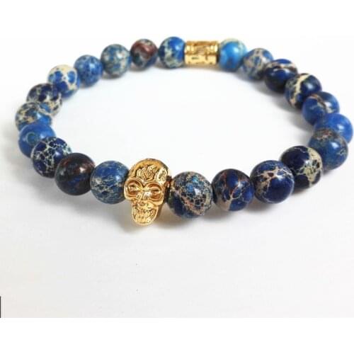 2018 New Arrival High Grade Men Jewelry 8mm Black Lava Stone Blue Sea Sediment Stone Bead with 24K Gold Skull Bracelet For Women